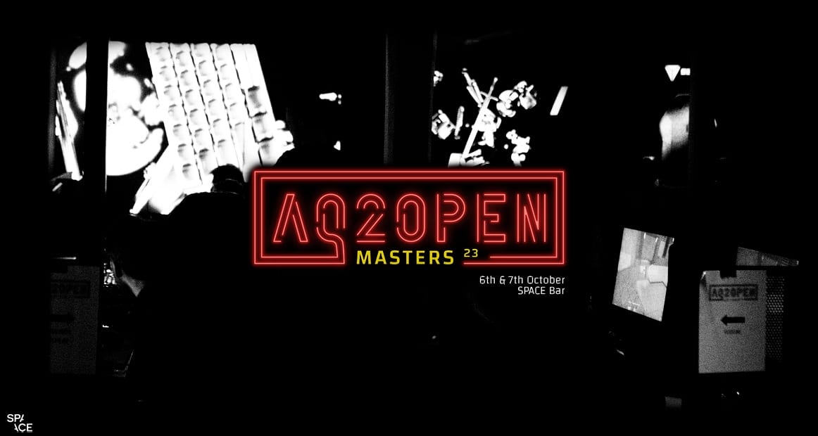 Black and white photo of the LAN crowd under the red neon “MASTERS 23” logo